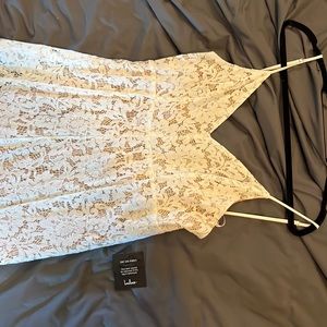 LuLu’s brand midi dress, white lace with beige lining.